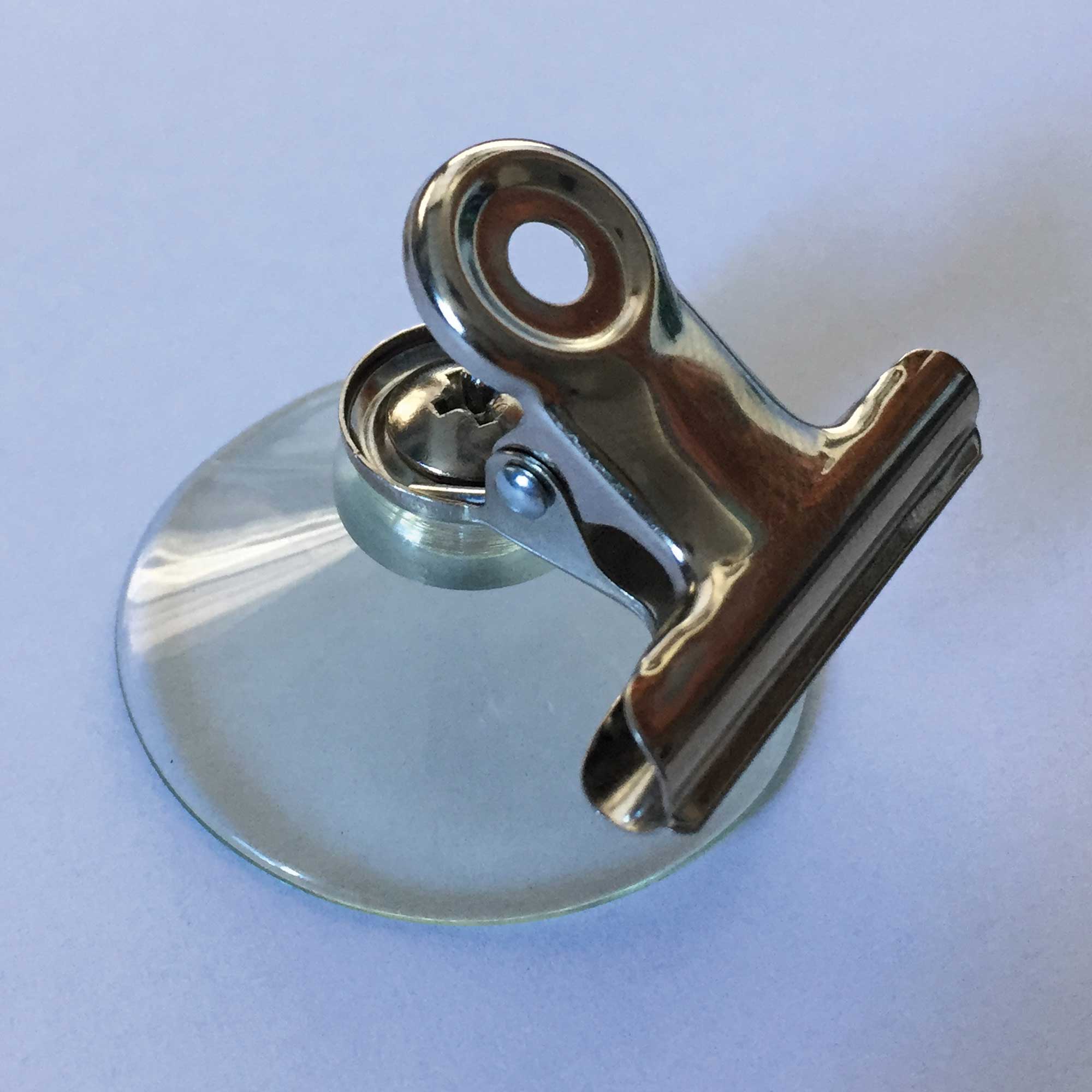 Suction cup with paper clip